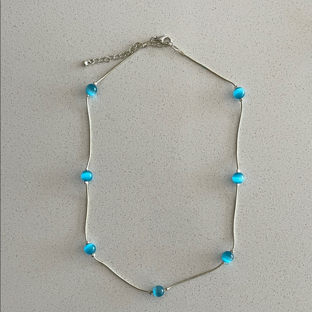 Chic Silver Necklace with Vibrant Blue Beads
